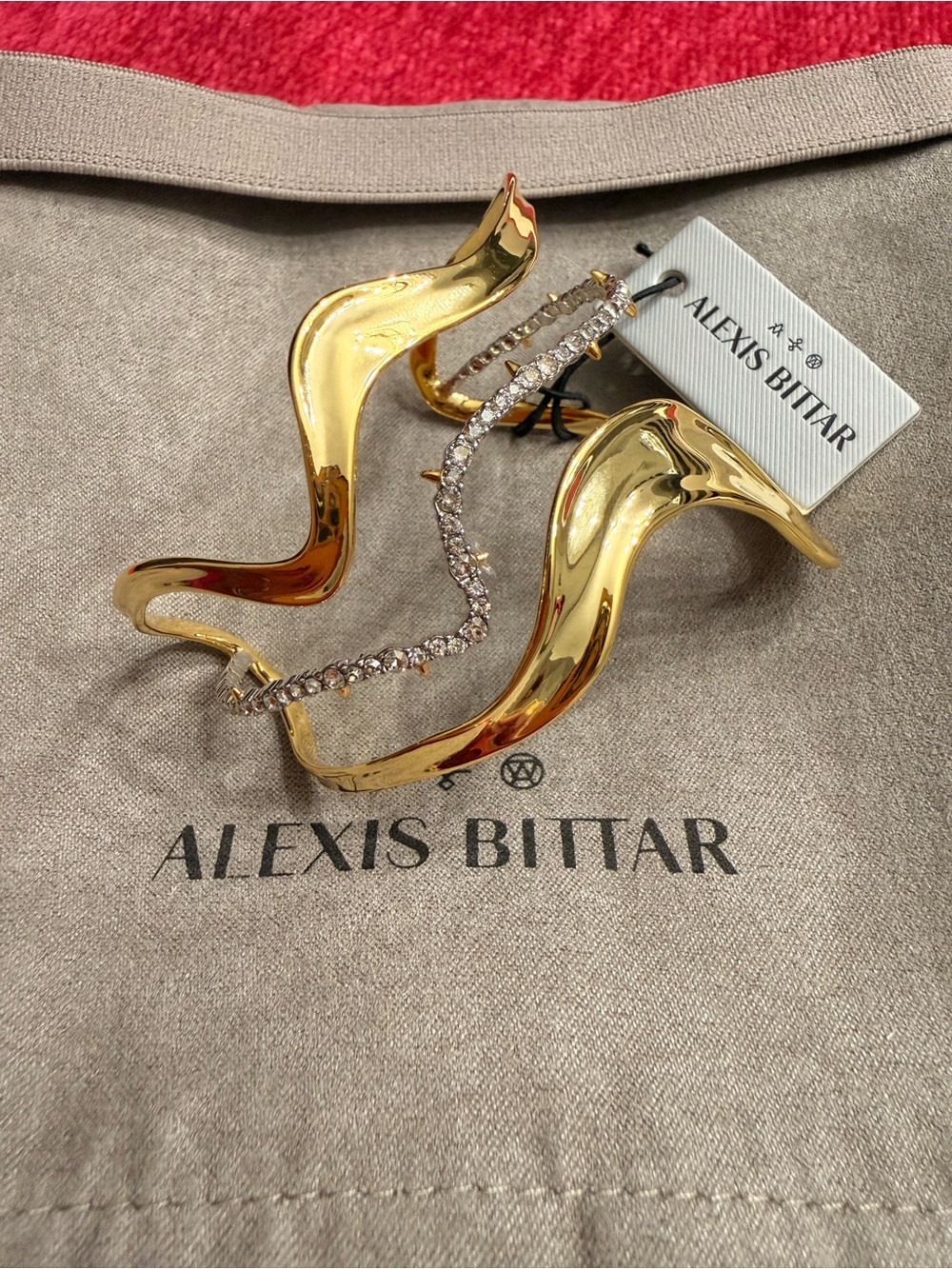 Alexis Bittar Gold Tone Wave Cuff with Crystal Ribbon. Neiman Marcus